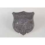 A lead fire insurance plaque in the form of a shield for London and Lancashire Fire