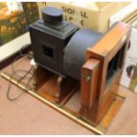 A large mahogany projector