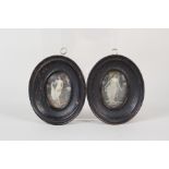 A pair of oval miniatures of semi clad ladies