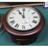 A circular mahogany fusee wall clock