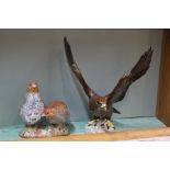 A Beswick golden eagle No.2062 plus a pair of partridges, No.