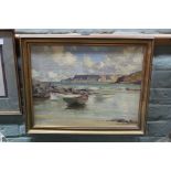 Maurice C Wilks oil on canvas of an Irish beach scene with moored row boats,