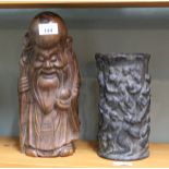 A Chinese wooden carving of Shou Lau plus a pottery figure decorated vase