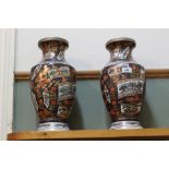 A pair of Chinese polychrome floral and landscape vases,