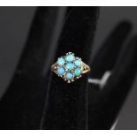 A gold turquoise cluster ring on later shank, stamped 18ct Plat,