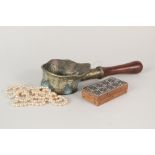 A Chinese brass smoothing iron, inlaid wooden box and jewellery,