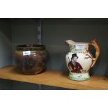 A Royal Doulton stoneware Autumn Leaves jardiniere plus a Crown Devon musical jug (chipped spout)