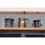 A 19th Century quart brass tankard with reeded decoration plus two 18th Century bronze mortars,