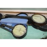 WITHDRAWN A cased American banjo with poker work decoration plus a cased Savana banjo mandolin