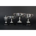 Five various silver trophy cups all with presentation inscriptions