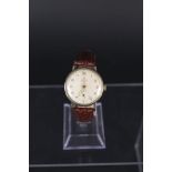 A gents 9ct gold Smiths Deluxe watch with sub-seconds dial,