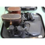 Four pairs of binoculars