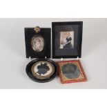 A Victorian oval miniature head and shoulders of a lady, a miniature of an Edwardian lady,