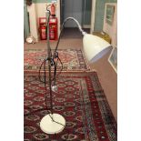 A chrome adjustable floor lamp by Best & Lloyd 'Bestlite'