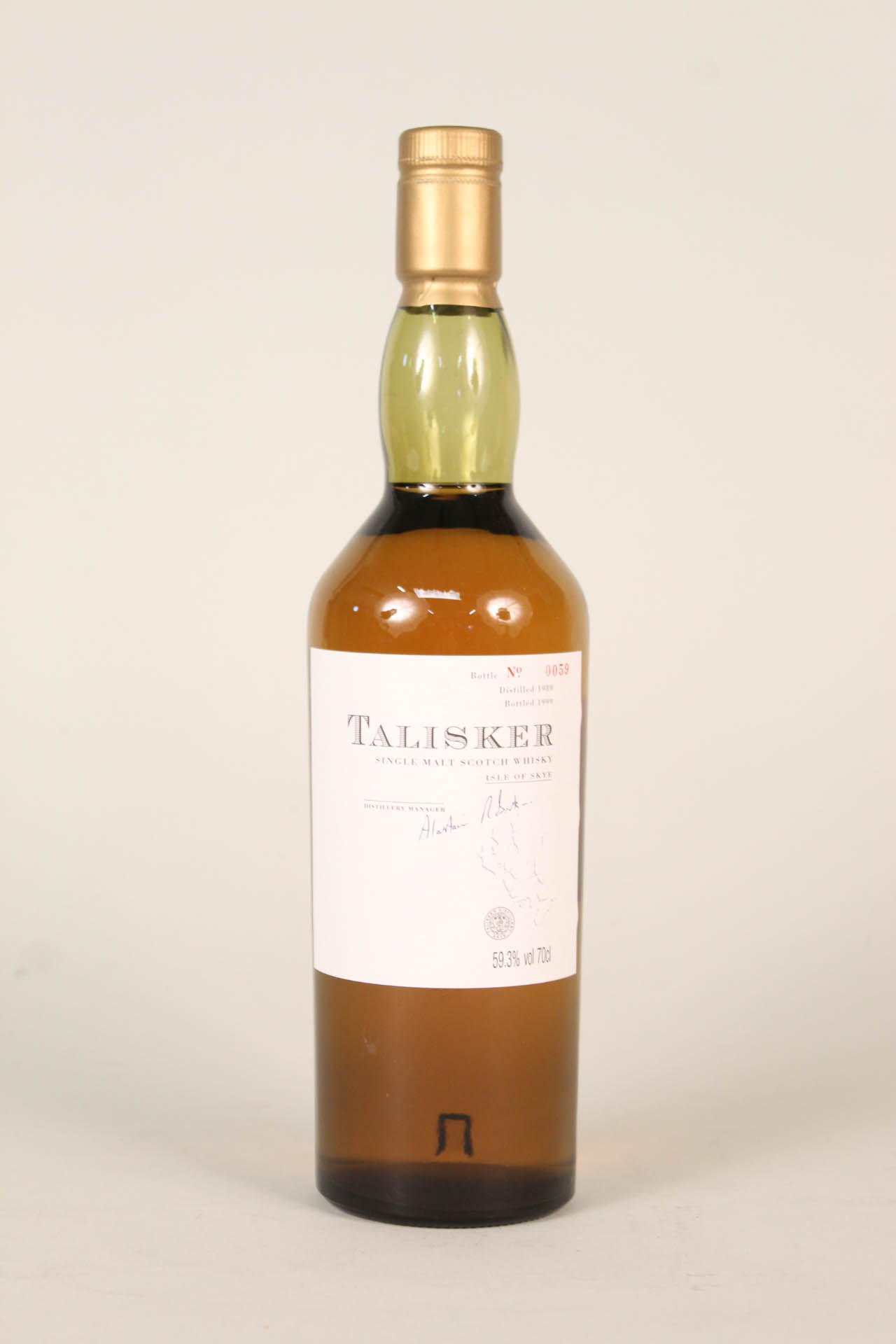 A bottle of Talisker limited edition Single Malt Whisky 1989,