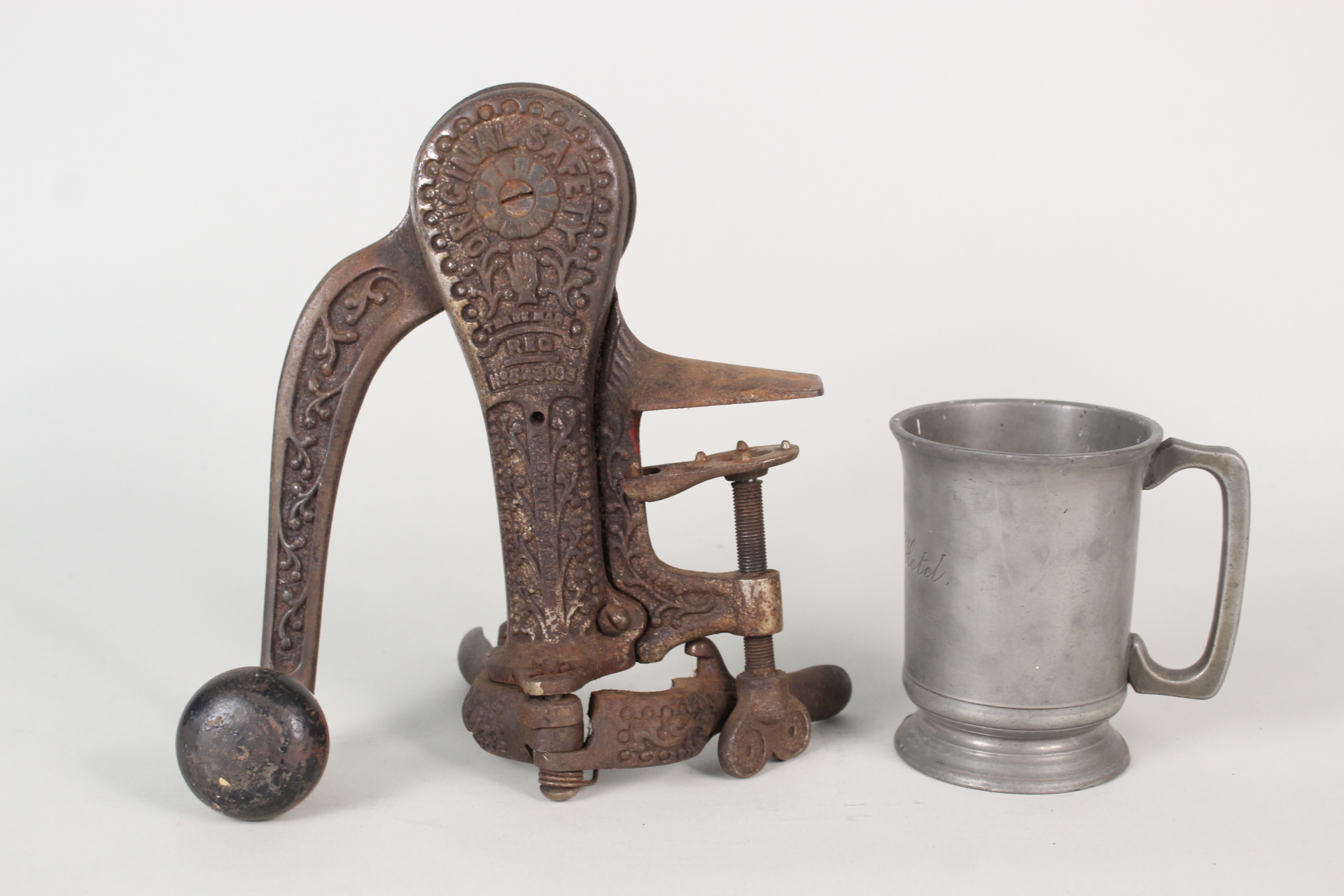 An Original safety bar corker plus a 19th Century pewter tankard