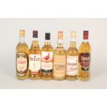 Six bottles, Famous Grouse, Bells Blended, Glenmorangie 10 year Single Malt,