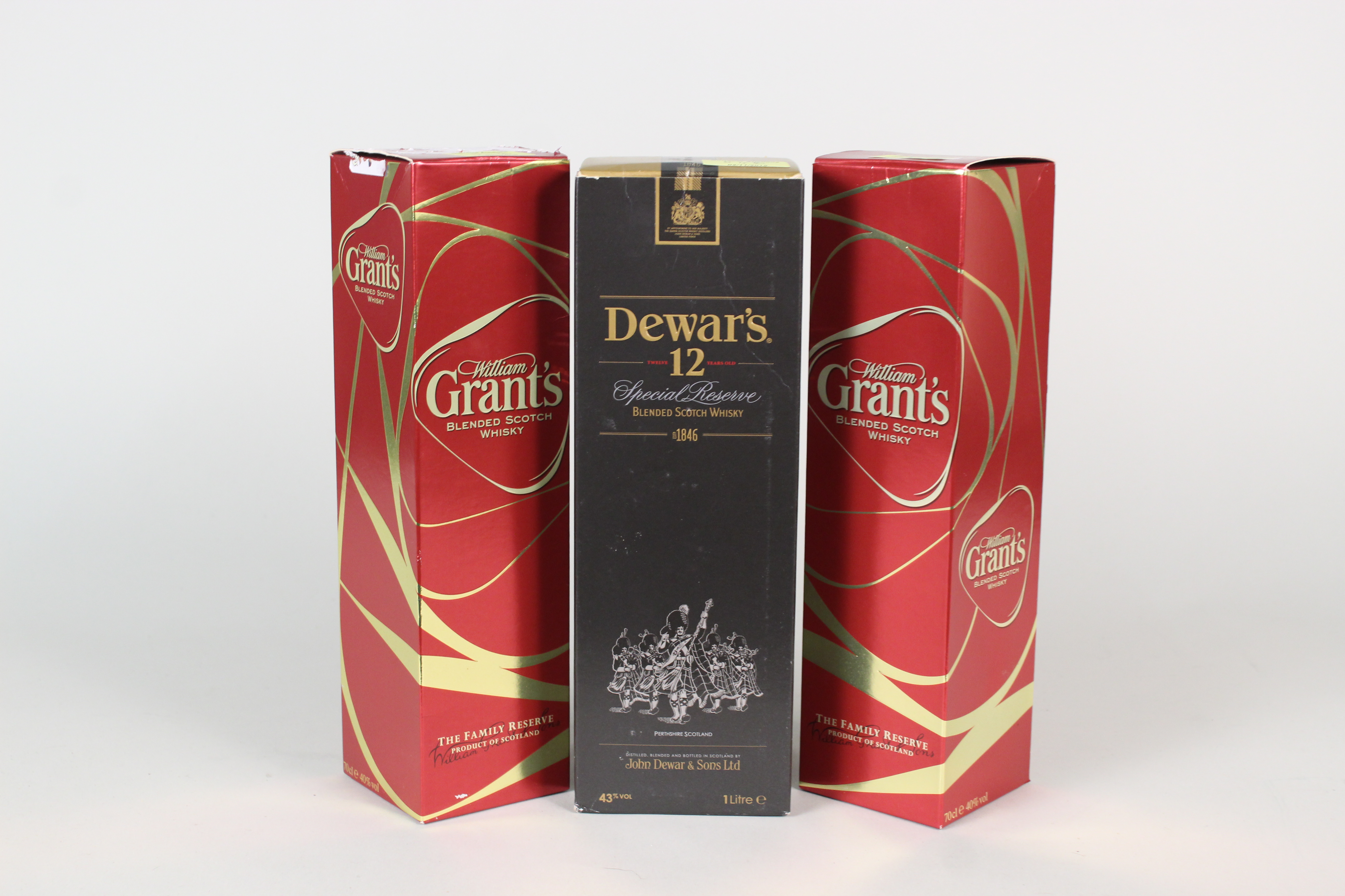 Two boxed bottles of Grants Blended Whisky plus Dewars 12 year Special Reserve Blended Whisky