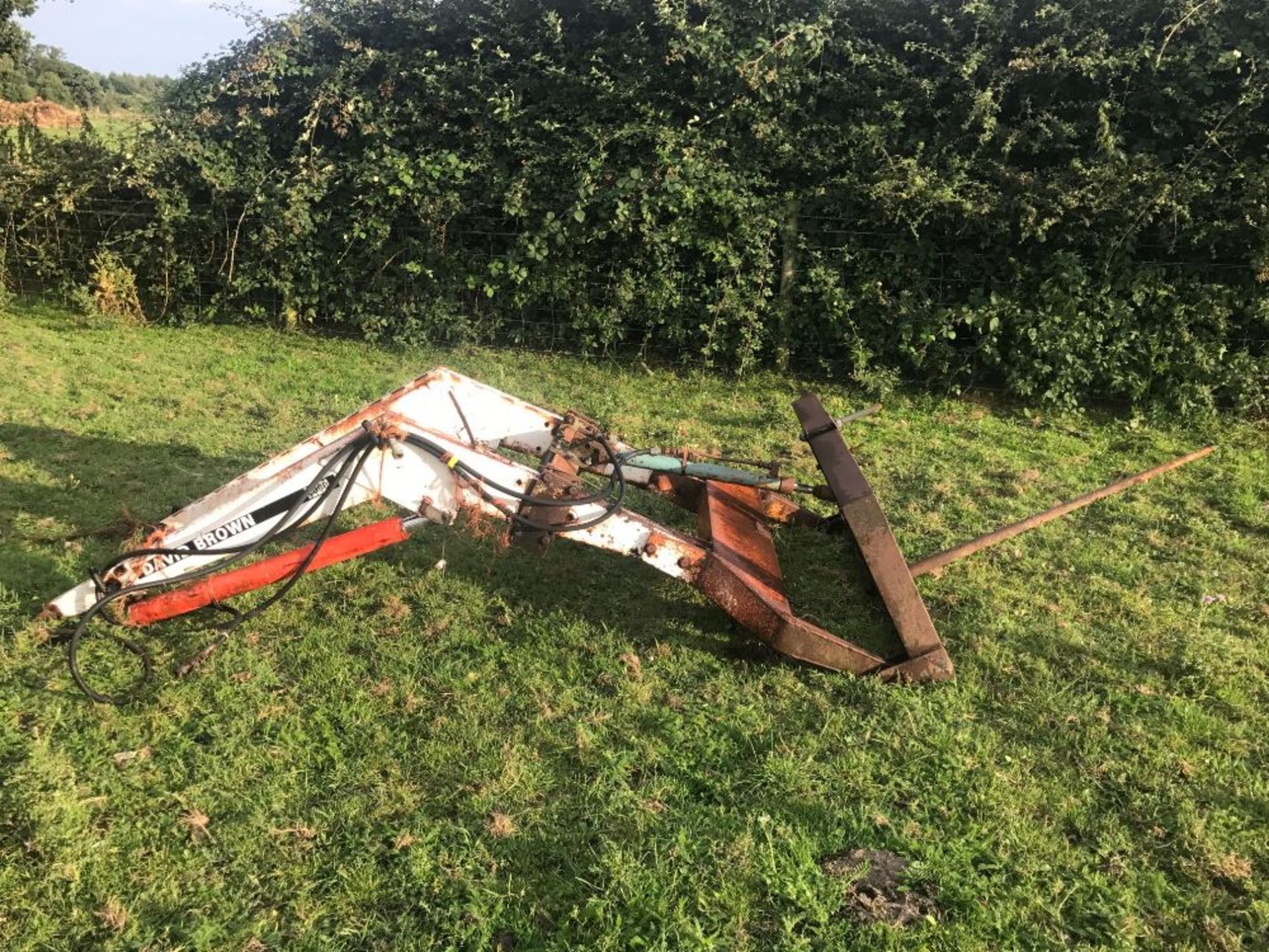 David Brown loader with bale spike. Stored near Goring Heath. No VAT on this item.