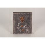 A silver framed Russian icon