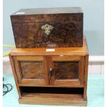 A 19th Century walnut two compartment tea caddy plus a mahogany and walnut two door table cabinet