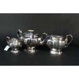 A silver three piece tea set by P Ashberry and Sons,