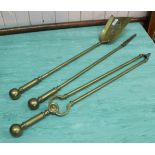 A set of three Victorian brass fire irons with pierced shovel