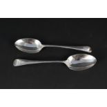 A pair of silver Walker & Hall serving spoons with engraved monogram
