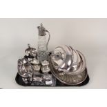 A collection of silver plated items including entree dishes, sauce boats,