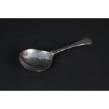 An antique white metal spoon,