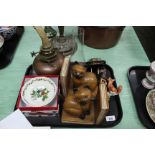 A pair of carved wooden cat bookends, copper oil lamp,