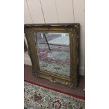 A gilt Gesso wall mirror,