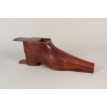 A large shop display snuff boot with brass nails and tortoiseshell lined compartment,