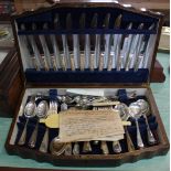 A mahogany canteen of Sheffield stainless cutlery plus an oak canteen of stainless and silver