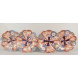 A set of four 19th Century Imari petal edge dishes,