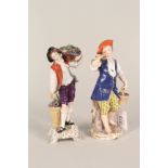 A matched pair of continental porcelain figurines of flower sellers,