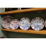 A 19th Century Imari petal edge dish plus six Japanese floral and figure decorated plates