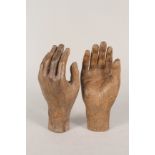 A pair of wood life size artists model hands,