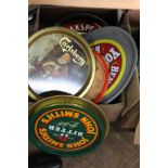 Various pub tin trays,