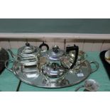 A four piece silver plated tea and coffee set by John Turton & Co plus an Art Deco twin handled