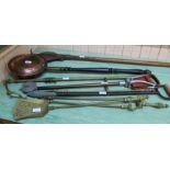 A set of three brass fire irons, curtain pole, Victorian copper warming pan, shooting stick,