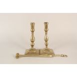 A pair of 18th Century seamed brass candlesticks plus 17th Century ember tongs