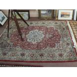 A machine made Persian pattern floral carpet,