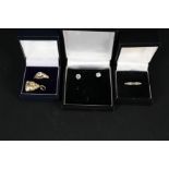 A pair of white stone set 9ct white gold earrings,
