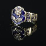 An antique gold memorial ring, the shank engraved 'In Memory Of' with blue enamel decoration,