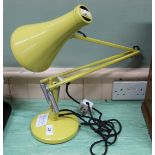 A Herbert Terry yellow angle poise lamp (this item is sold as a collectors item only and has not