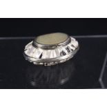 A fine 18th Century mother of pearl and cowrie shell white metal mounted snuff box