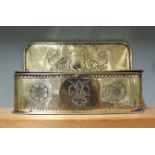 A 19th Century Dutch hanging brass candle box having raised back embossed with Coat of Arms and