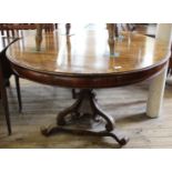 A French style mid 19th Century rosewood veneer pedestal dining table on unusual ornate tripod base