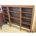 A 1920's oak adjustable bookcase of large proportions